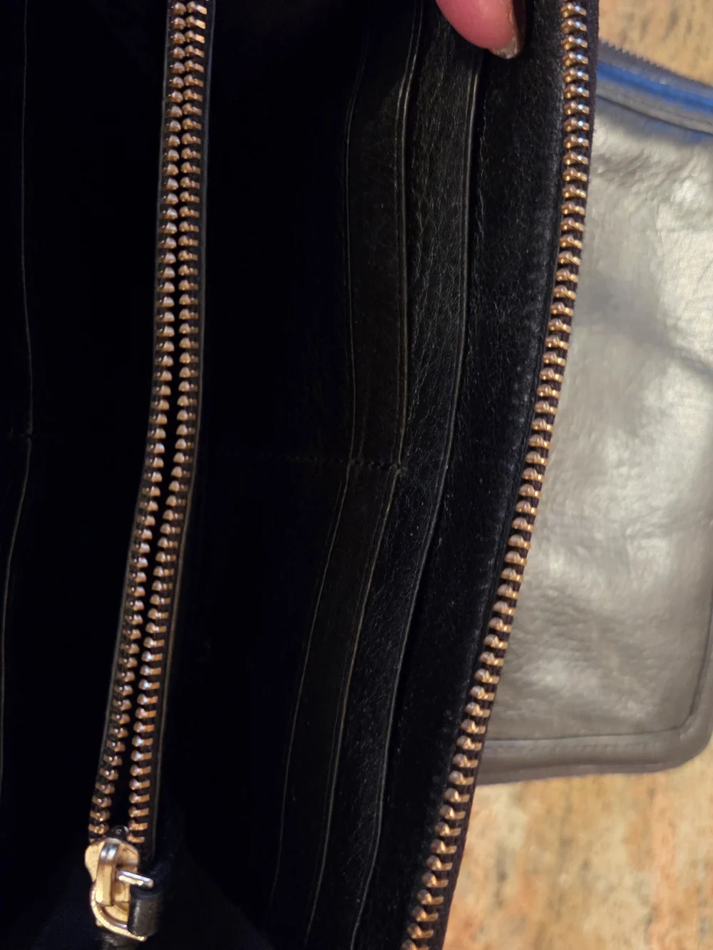 Two Tory Burch Black Leather Zip Wallets